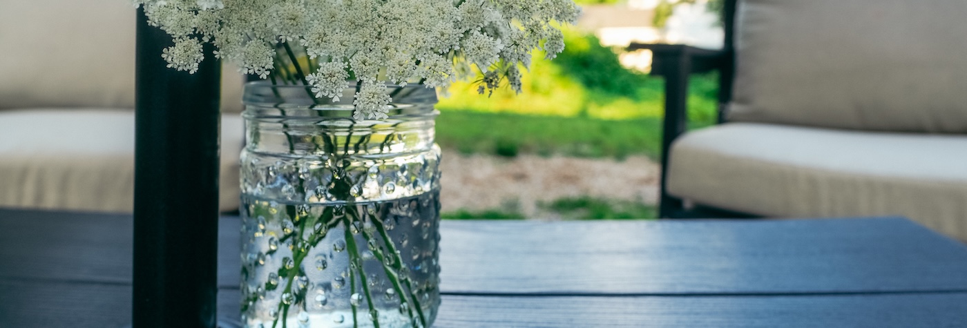 flowers on a table in a glass